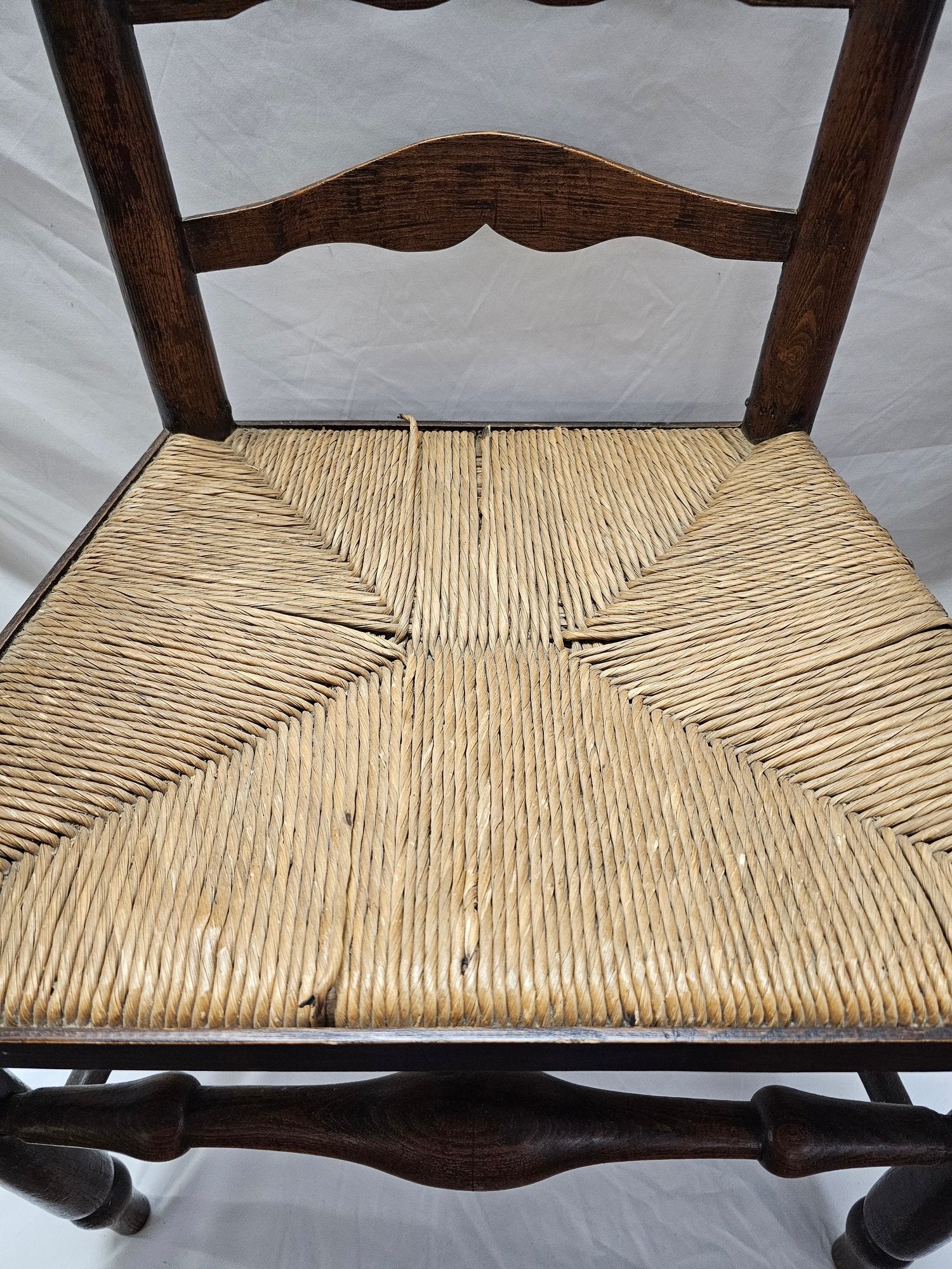 Matched Pair Of Antique Eighteenth-Century English Ladderback Rush Seat Chairs