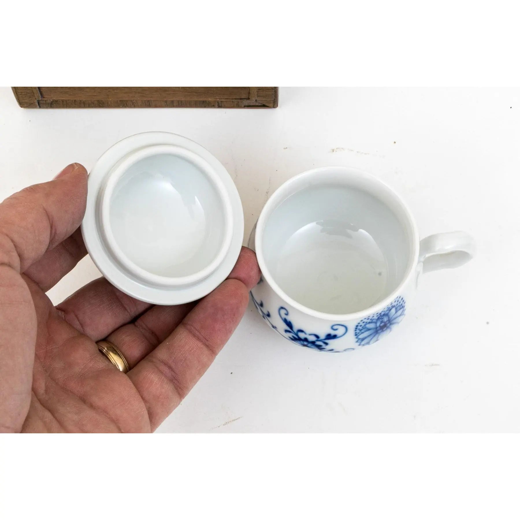 Meissen Porcelain Trio - 1979 Snow Queen Plate, Blue Onion Cream Cup, and White Blossom Relief Bowl