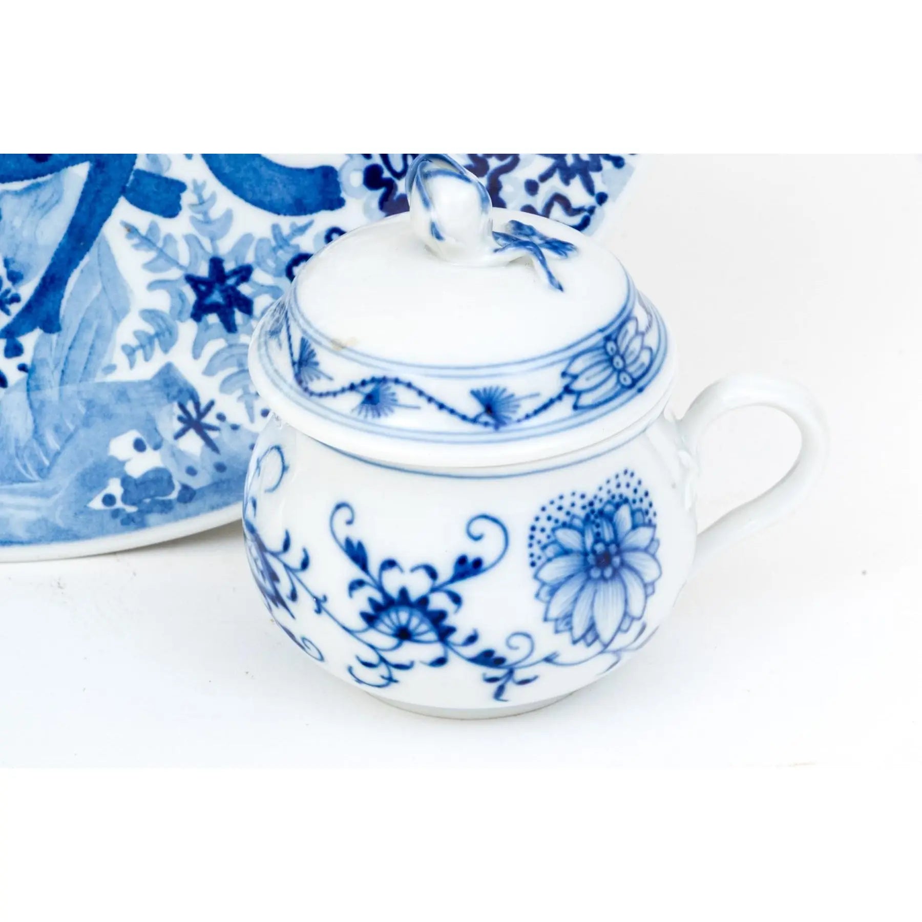 Meissen Porcelain Trio - 1979 Snow Queen Plate, Blue Onion Cream Cup, and White Blossom Relief Bowl